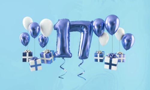 Ballon portant le chiffre 17 avec des cadeaux autour.